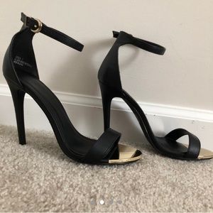 Black heeled strappy sandals